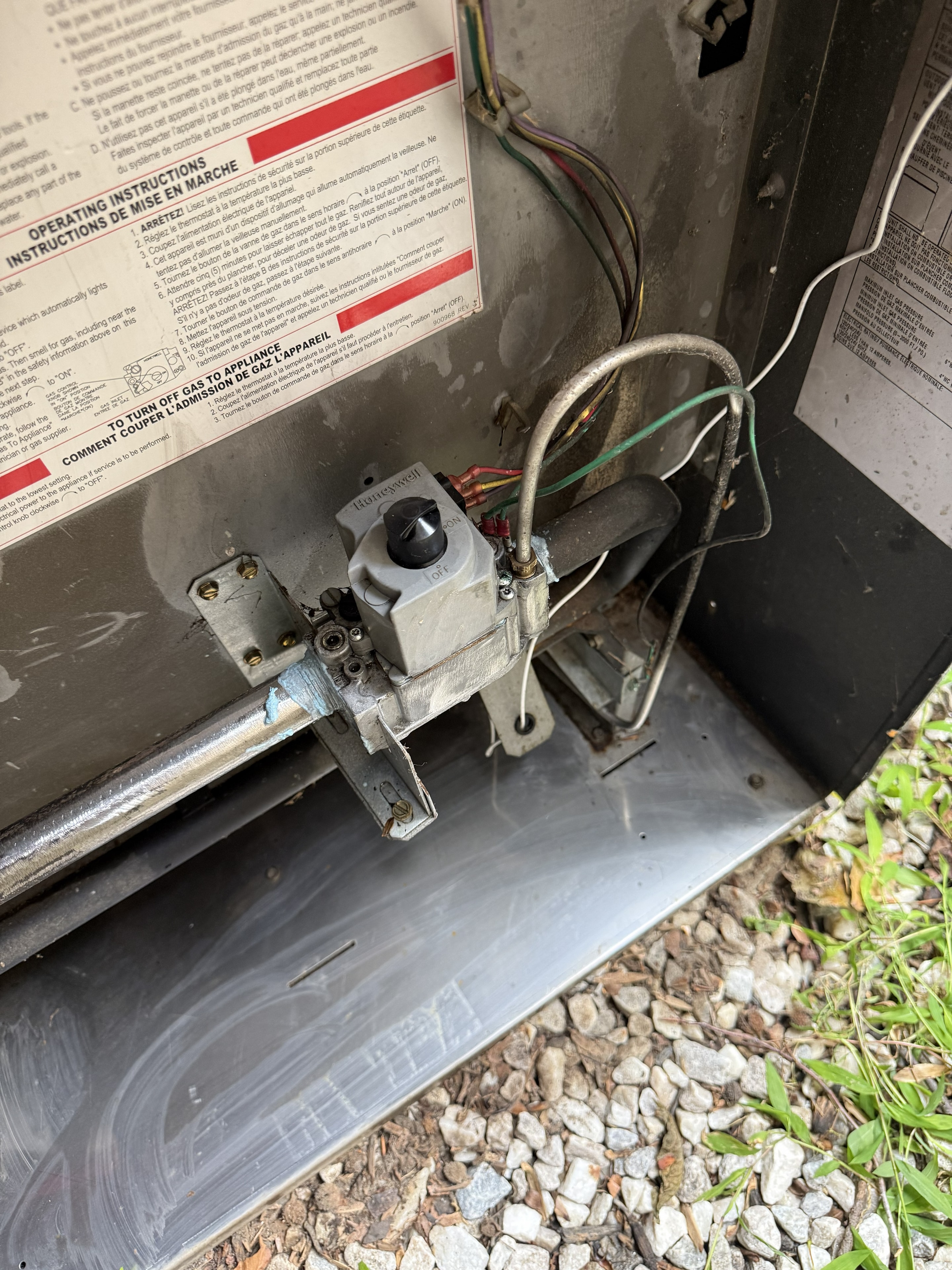 Honeywell gas valve on pool heater — wide view of valve and connections