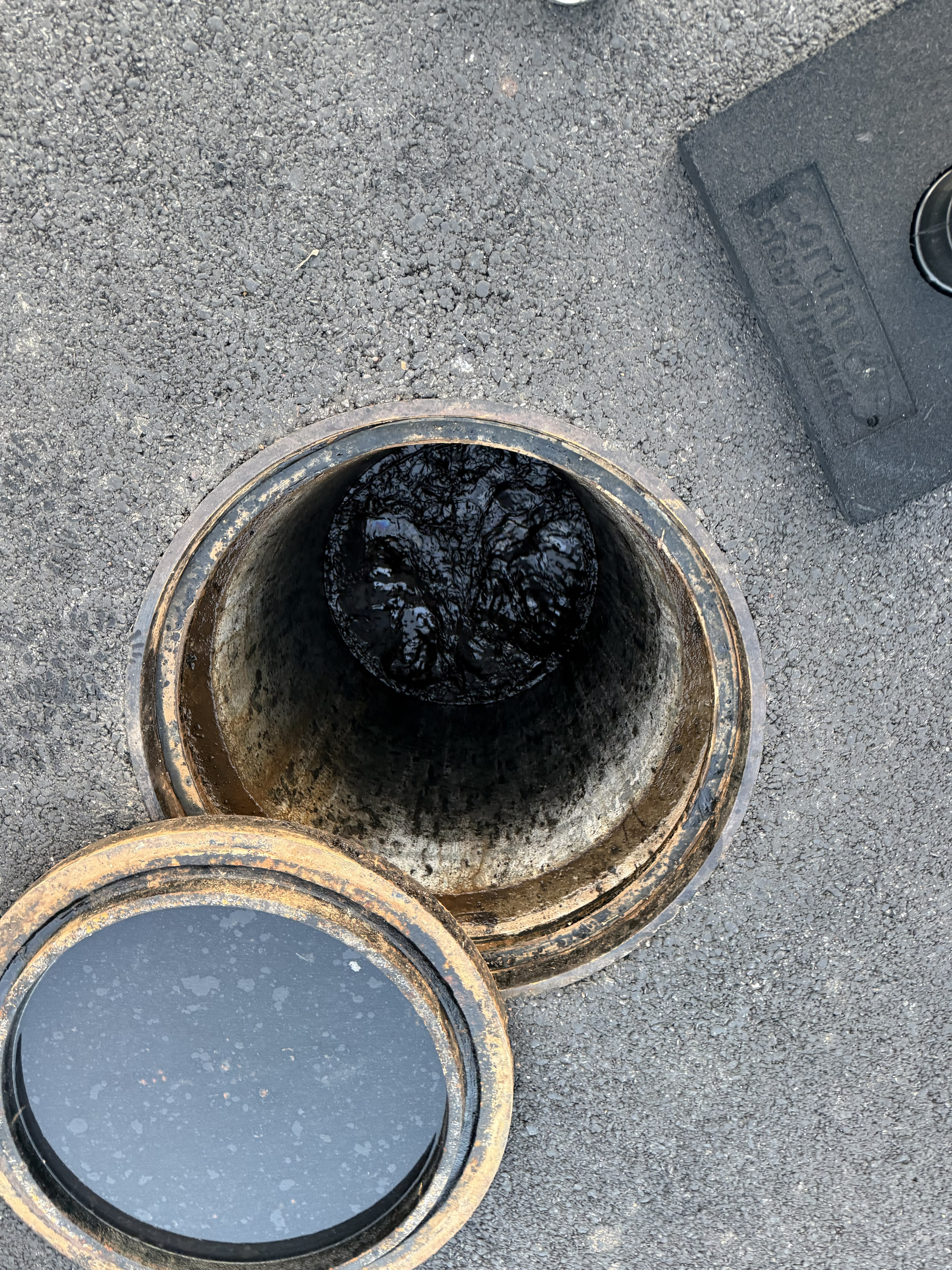 Drain after partial clearing — water beginning to flow