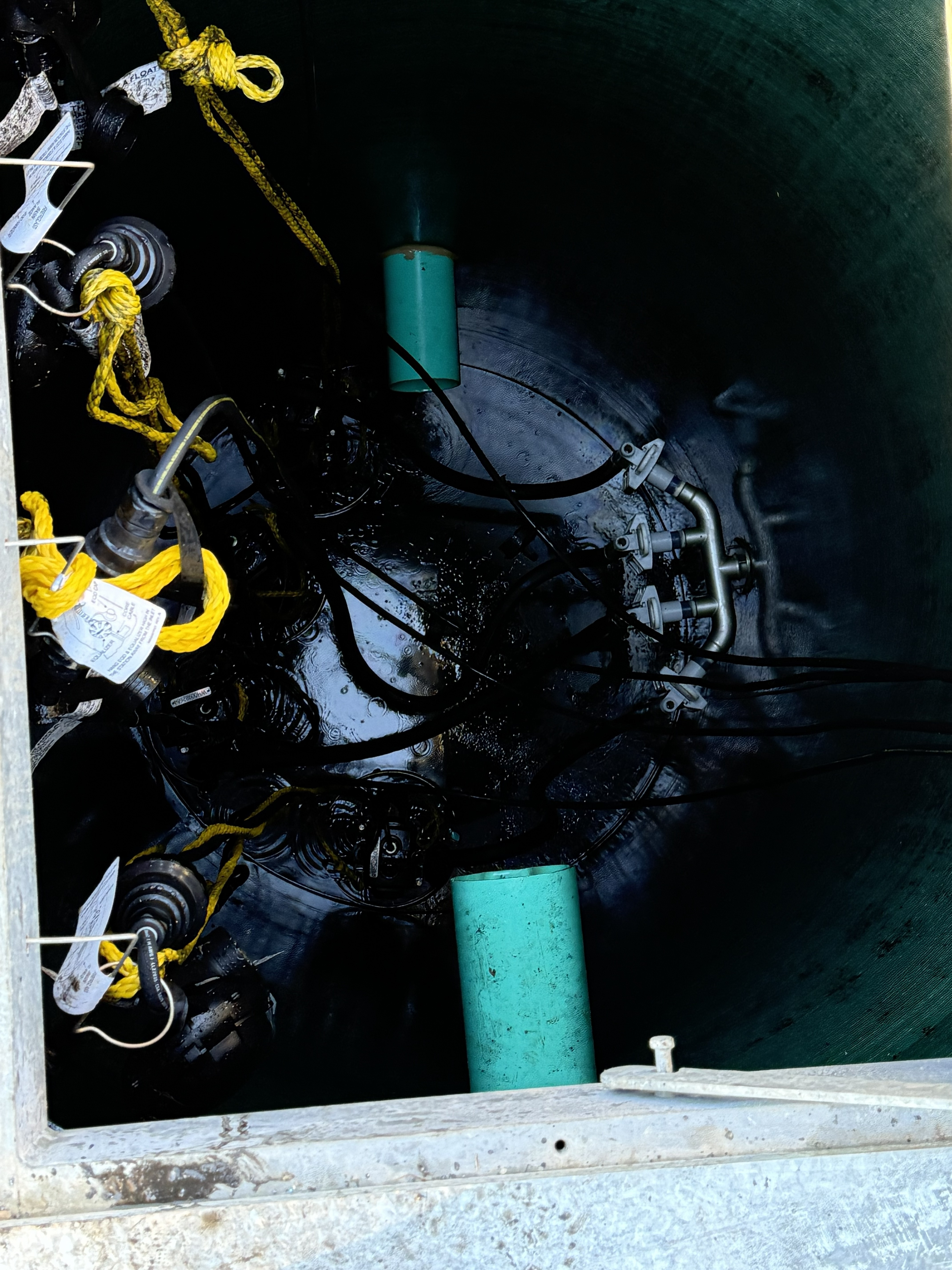 Completed lift station service — clean wet well with properly functioning pump system